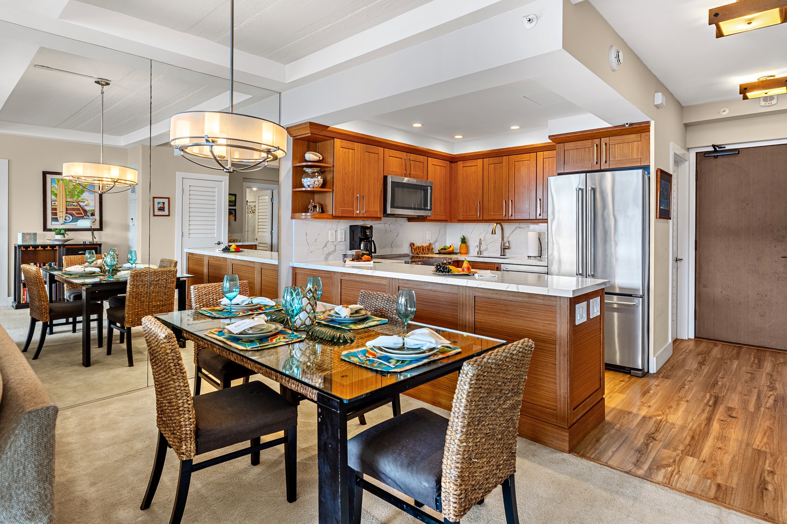 Your gourmet kitchen awaits with rich wood cabinetry, granite counters, and stainless steel appliances. Perfect for preparing memorable meals together.