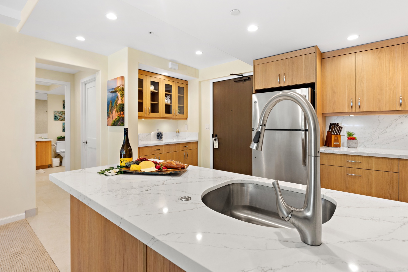Cook with ease in a thoughtfully designed, fully equipped kitchen. Featuring modern appliances, ample counter space, and all the essentials you need, from quick island breakfasts to full home-cooked dinners.