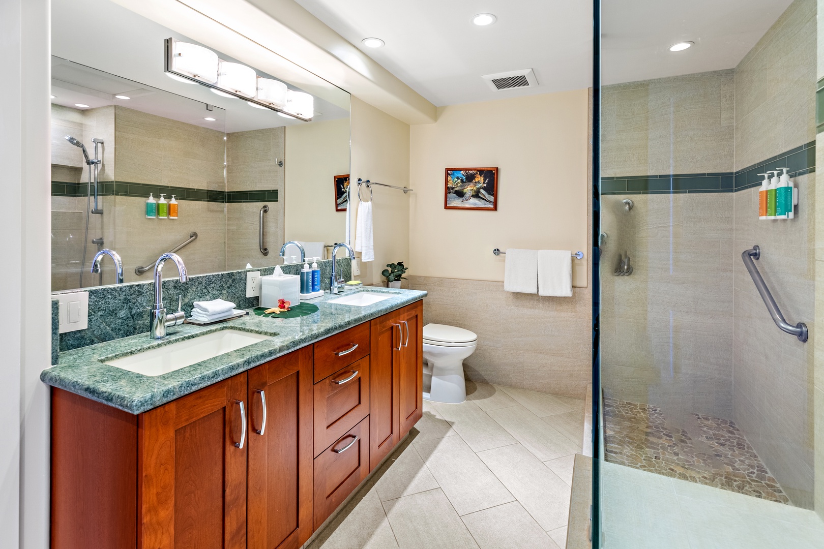 Your spacious bathroom offers dual sinks, a walk-in shower with grab bars, and plenty of counter space—everything you need to start your day refreshed and ready.
