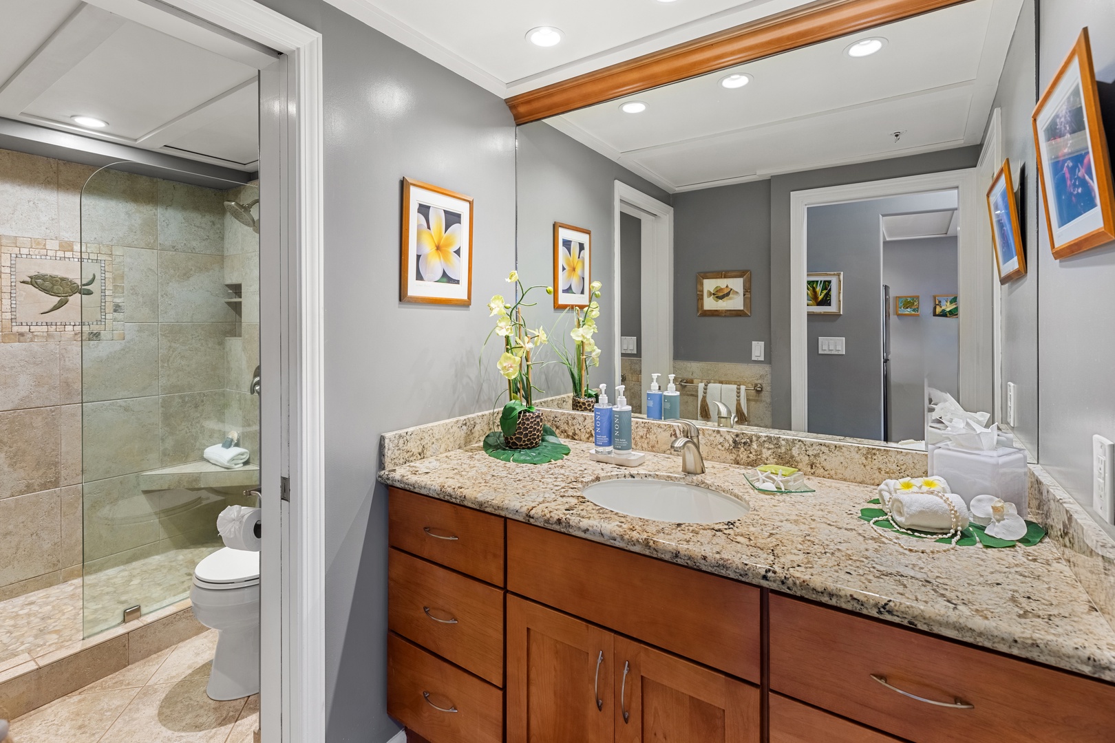 A private bathroom designed for comfort and relaxation. Featuring elegant finishes, a spacious layout, and a calming atmosphere to start and end your day in island style.