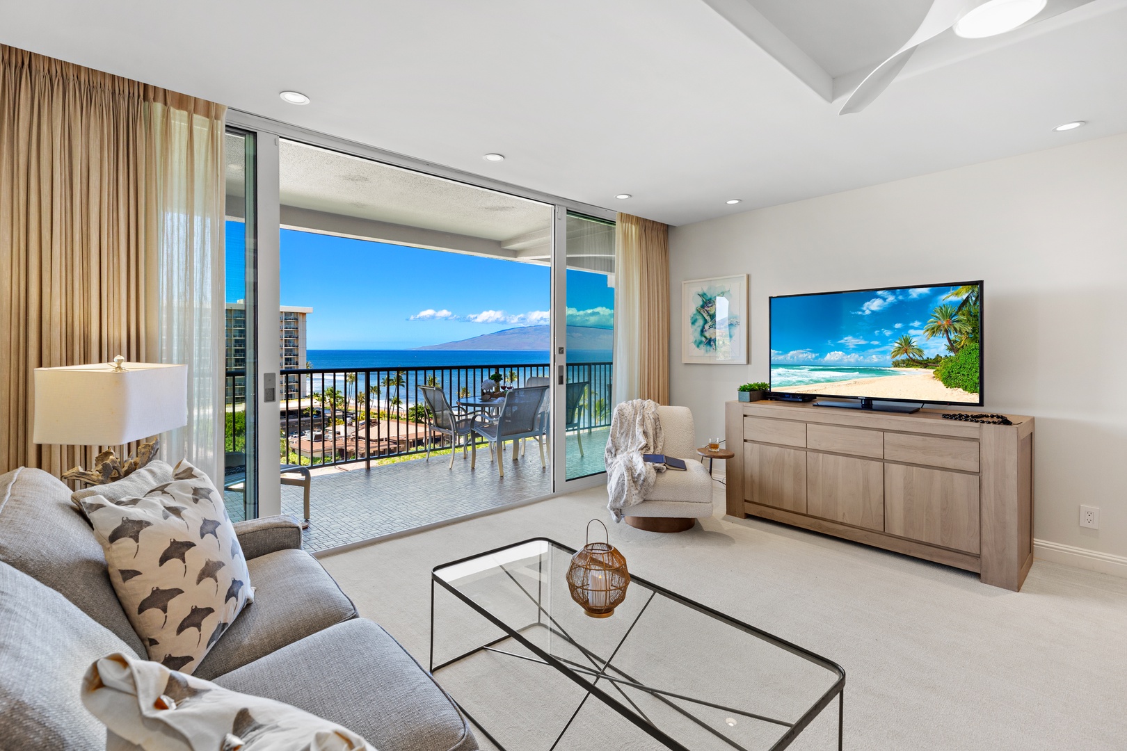 Relax in your bright, modern living space with plush seating and ocean views just steps from your private balcony. Natural light fills the room, perfect for unwinding after a day of adventure.