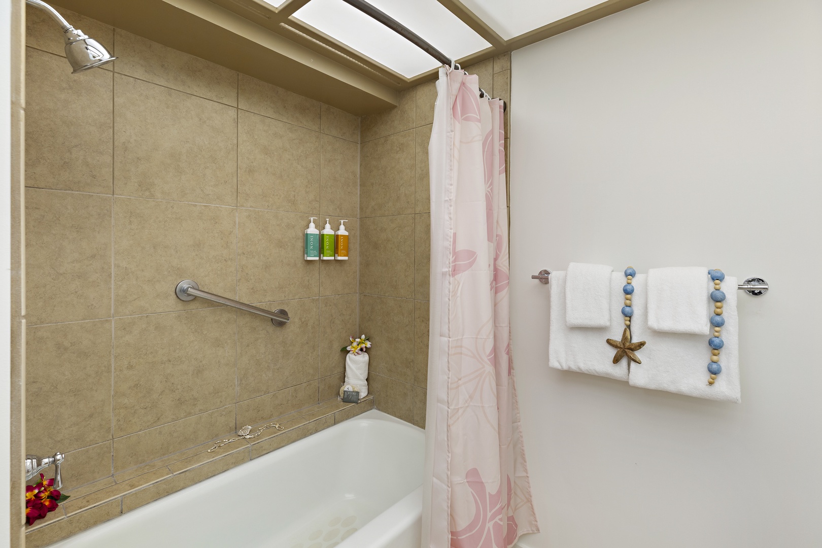 Unwind in your own private spa with thoughtful amenities and beach-inspired touches that make every shower feel like a mini vacation.