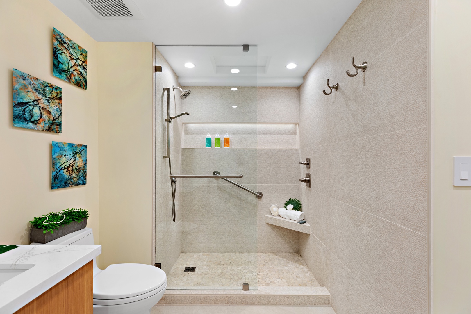 Step into a spacious walk-in shower designed for a spa-like experience. Featuring sleek finishes and a refreshing, open design. Perfect for rinsing off after a day in the sun and sand.