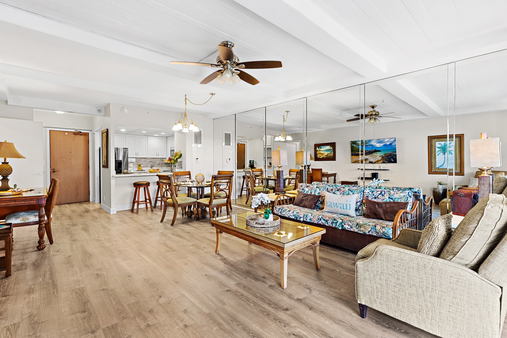 Step into your airy island retreat where natural light dances across soaring ceilings, tropical touches invite relaxation, and an open floor plan lets you gather with loved ones from kitchen to lounge in effortless comfort.