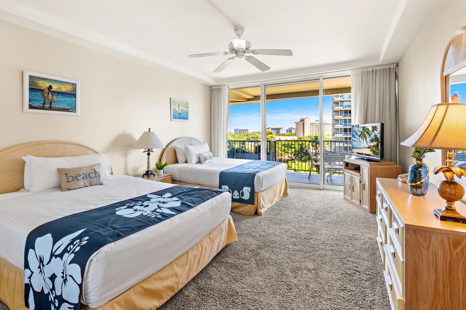 Your bright, inviting retreat features two comfortable beds and a private balcony where you can step outside and enjoy the surrounding views with your morning coffee or evening wind-down.