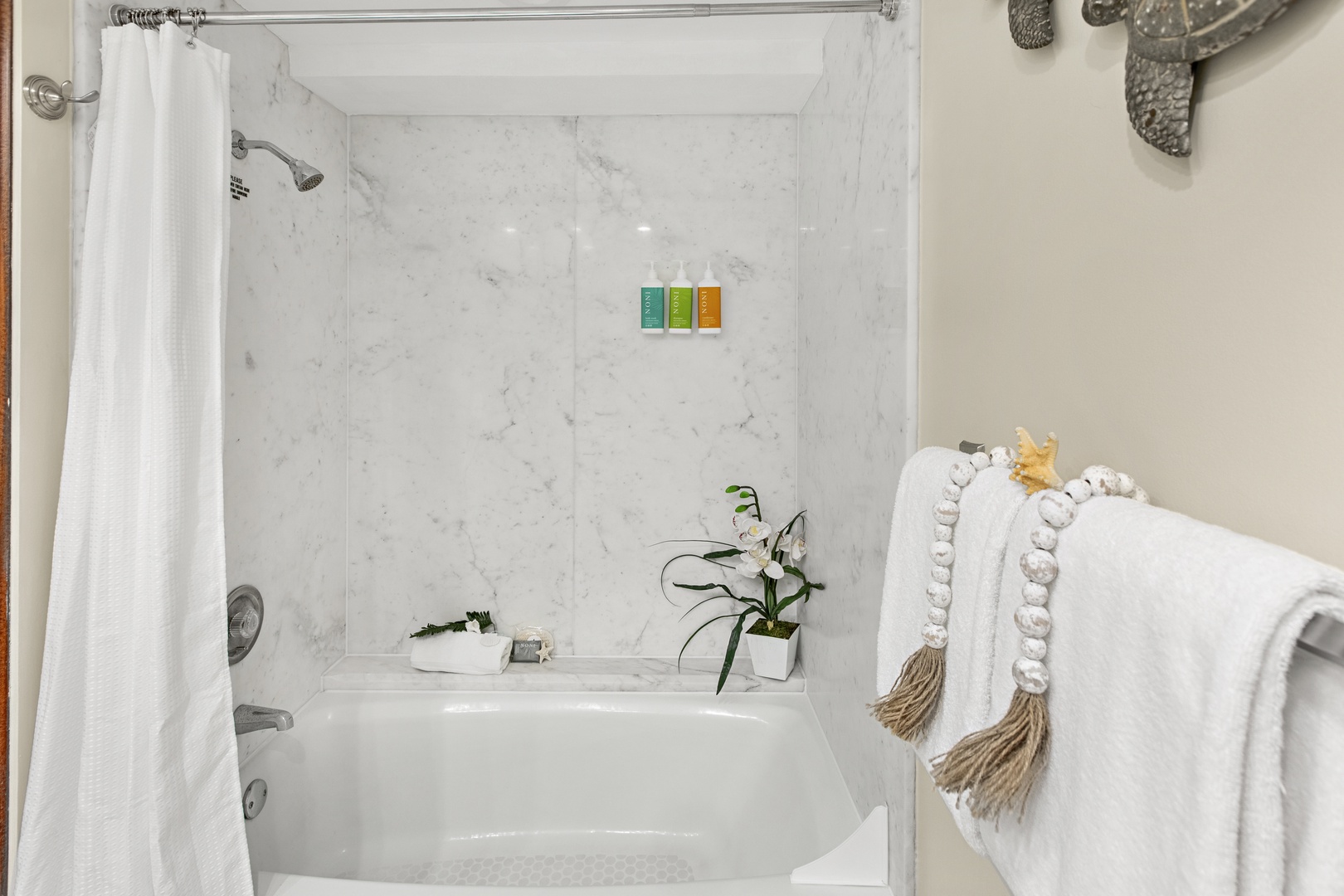 Unwind in your marble-appointed bathroom with luxurious amenities and fluffy towels waiting for your arrival.