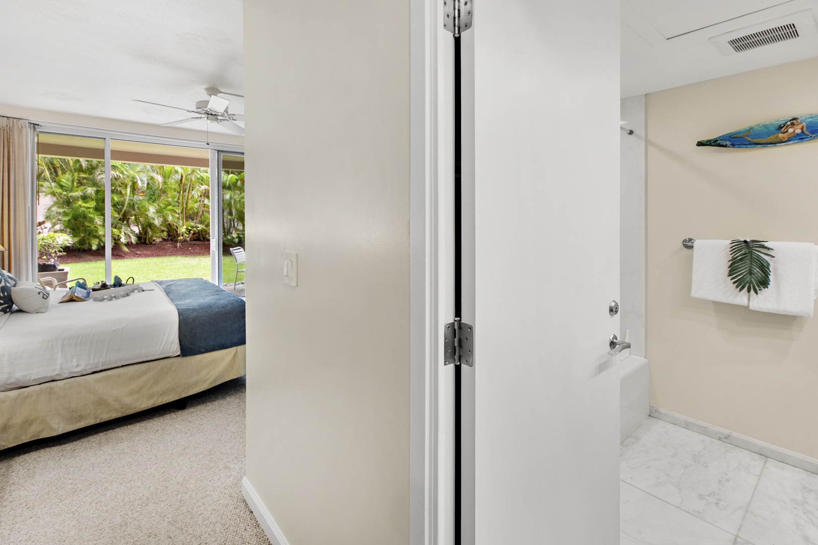 Your private ensuite bathroom offers a luxurious soaking tub where you can unwind after tropical adventures.