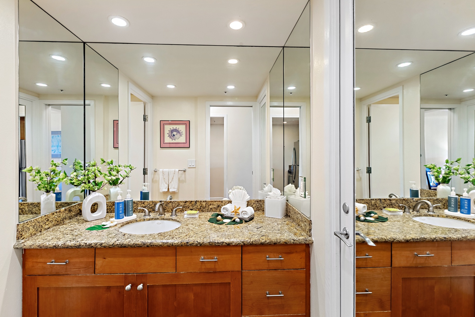 Elevated comfort and thoughtful design. A beautifully appointed guest bathroom featuring a spacious vanity and refined finishes that bring a touch of island luxury to your everyday routine.