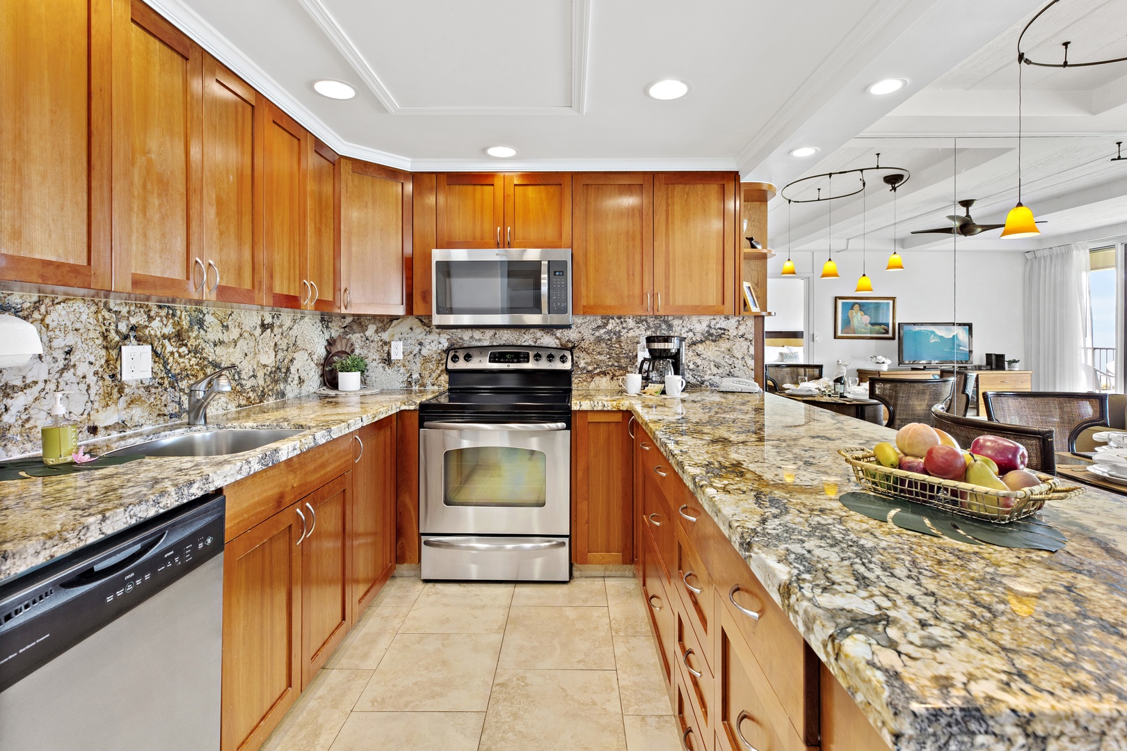 Create memorable meals in your fully equipped gourmet kitchen featuring granite countertops, stainless steel appliances, and spacious design perfect for cooking.