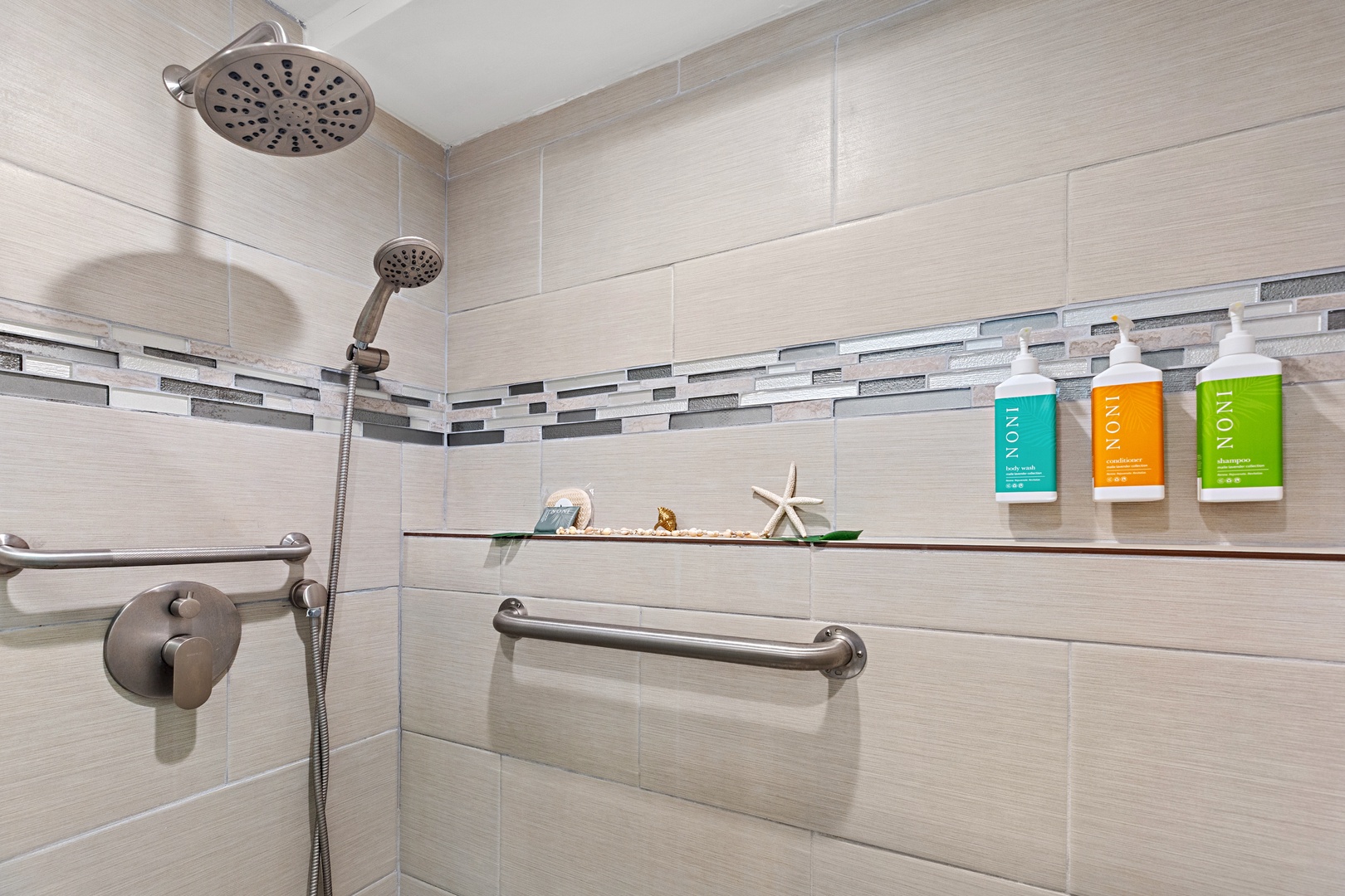 Rinse away the day under dual rainfall and handheld showerheads, with coastal decor and premium toiletries to enhance your refreshing escape.
