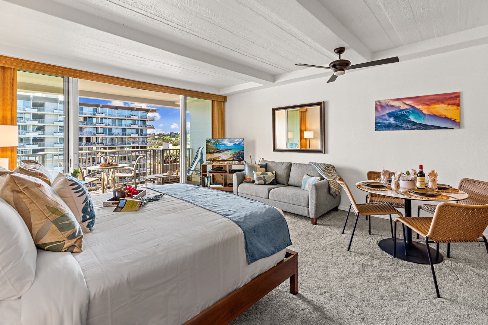 Sink into your plush bed with ocean breezes flowing through open balcony doors, relax on the sofa, or share meals at your private dining table—all bathed in natural light.