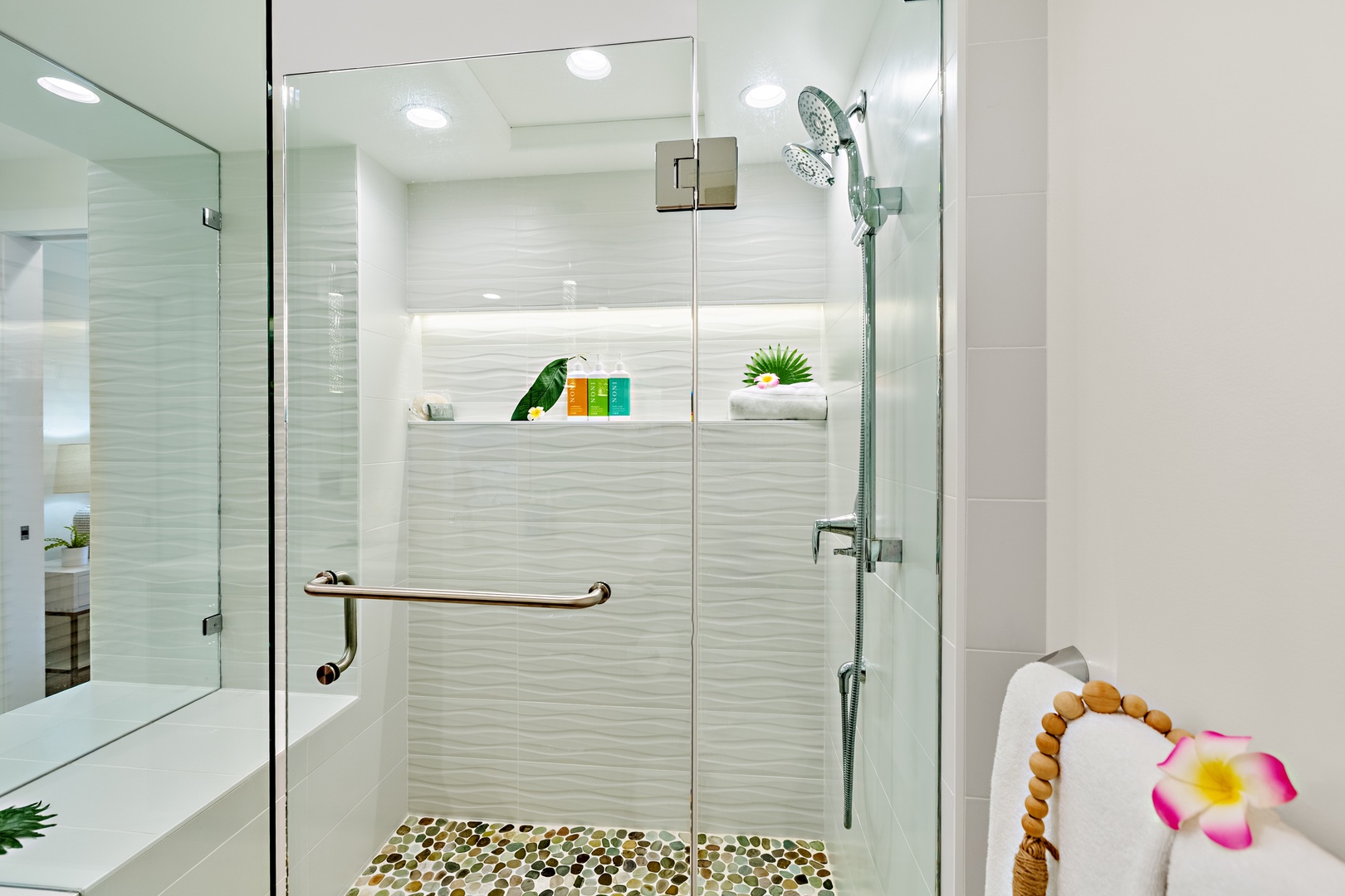 Step into a spacious walk-in shower designed for a spa-like experience. Featuring sleek finishes and a refreshing, open design. Perfect for rinsing off after a day in the sun and sand.