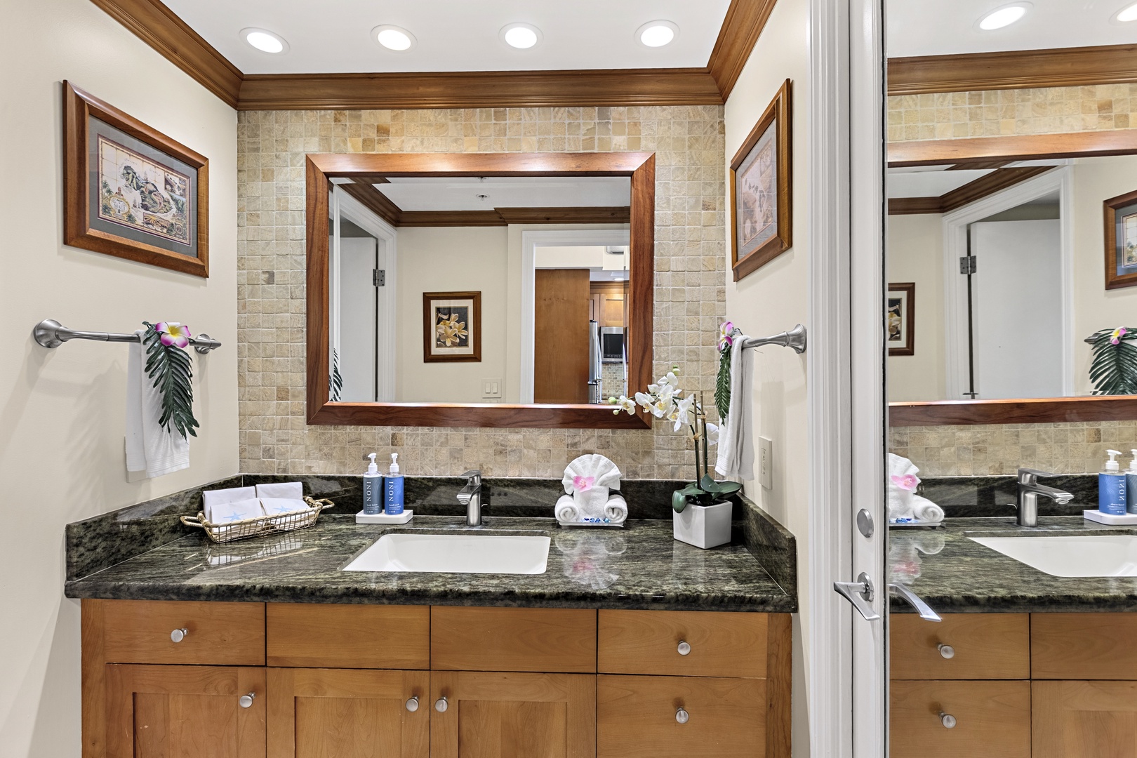Your elegant bathroom features granite counters, thoughtful amenities, and warm wood finishes for a luxurious start to each day.