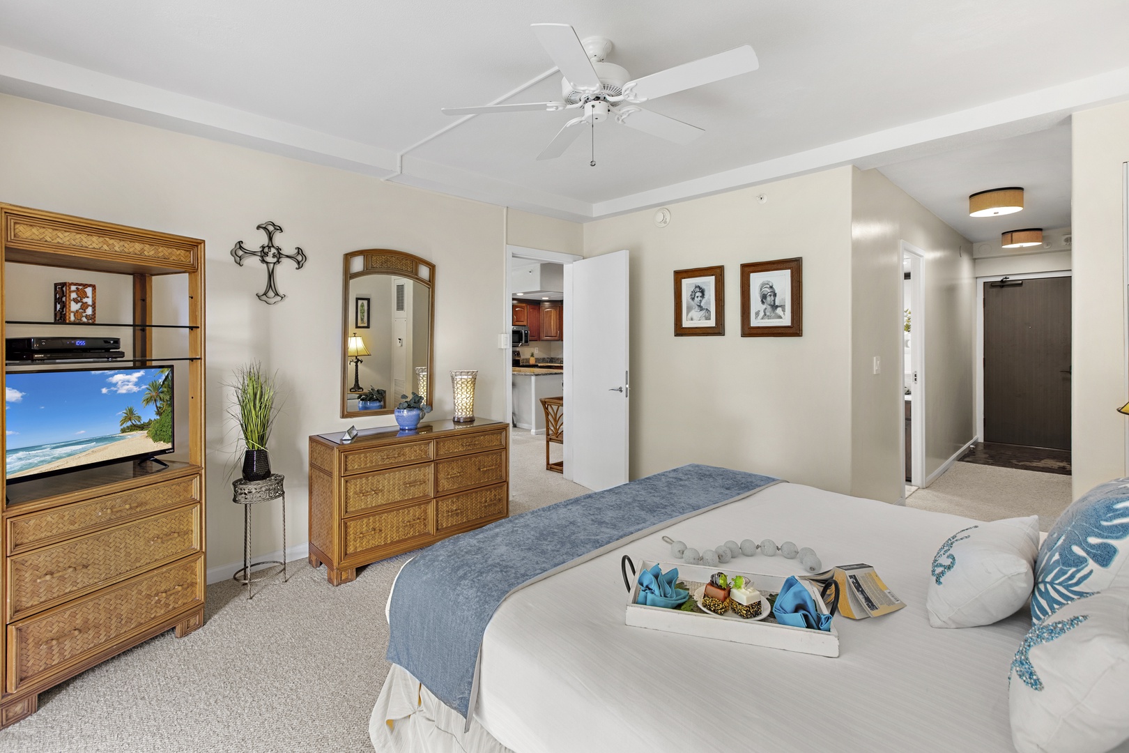 Unwind in your tropical bedroom retreat with warm wood furnishings, and thoughtful touches that make you feel instantly at home.