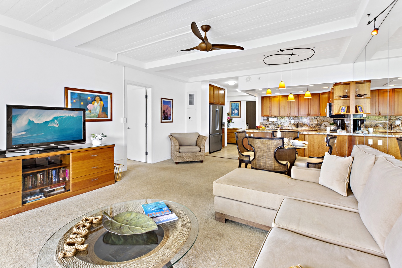 Relax in your open-concept living space with vaulted ceilings, modern kitchen, and comfortable seating perfect for unwinding after island adventures. Spacious living area features a comfortable pull-out sofa sleeper