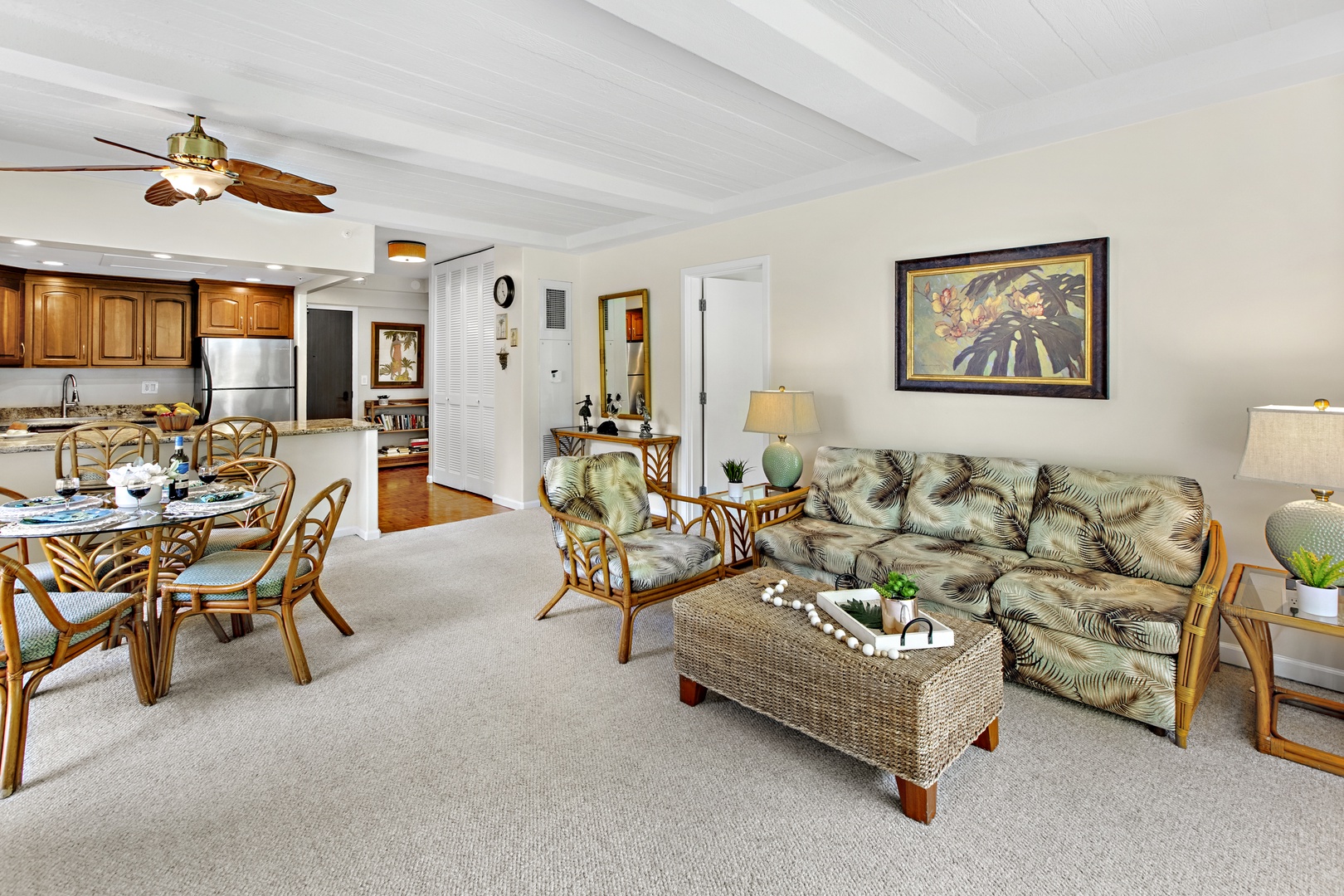 Relax in your spacious tropical-themed living space with bamboo furnishings, open kitchen, and island-inspired decor that makes you feel instantly at home.