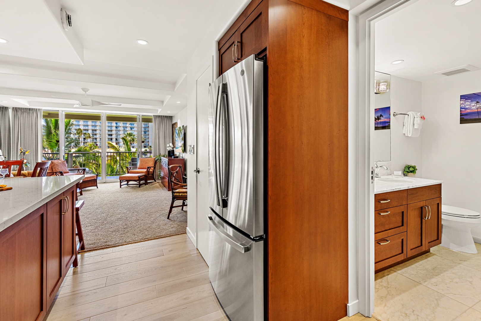 Your gourmet kitchen awaits with rich wood cabinetry, counters, and stainless-steel appliances. Perfect for preparing memorable meals together.
