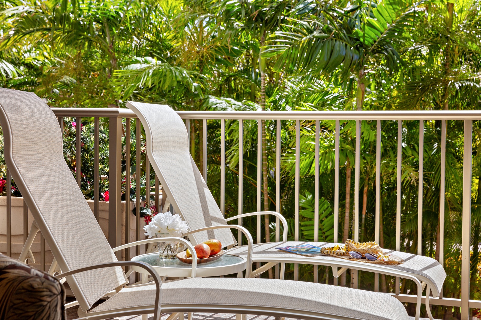 Serene Mountain views right from your private balcony. Unwind in comfortable outdoor seating as the island’s lush peaks and golden skies create the perfect peaceful escape.