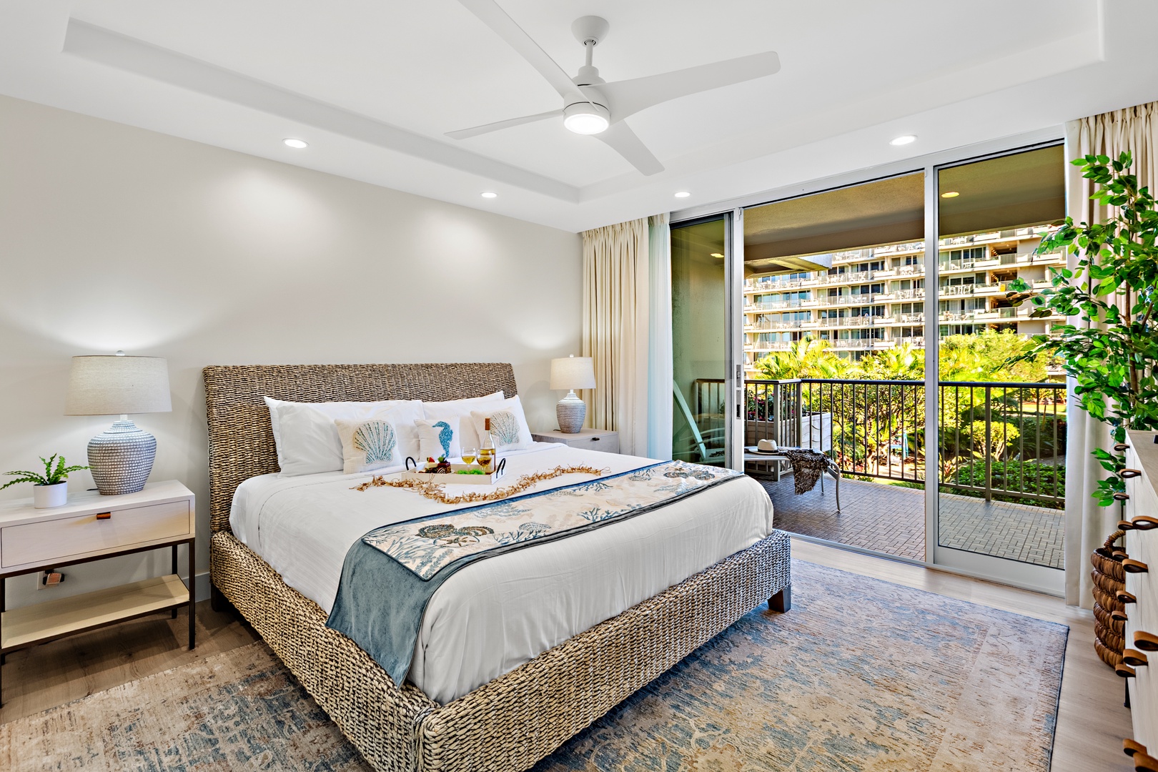 Wake up to island light and step straight out to sweeping resort views. This bright, airy bedroom features a plush king-size bed for ultimate comfort, with direct access to a private balcony that blends indoor-outdoor island living in the heart of paradis