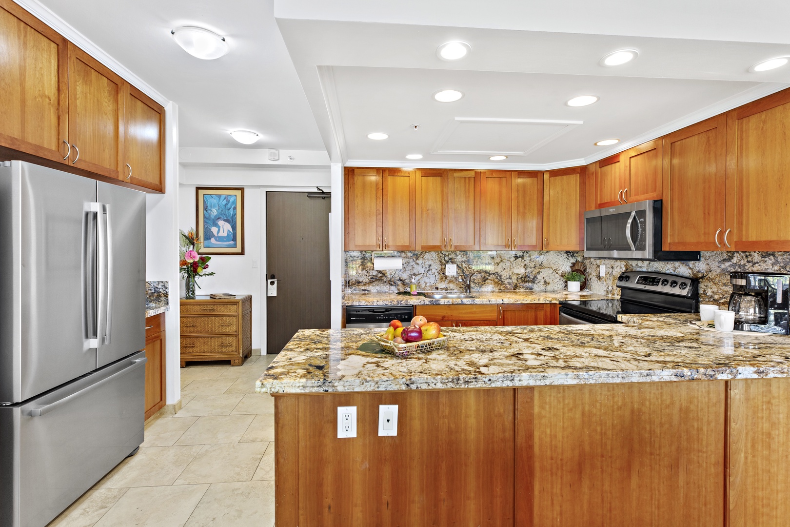 Your fully equipped kitchen features granite countertops, stainless steel appliances, and plenty of space for preparing delicious meals during your stay.