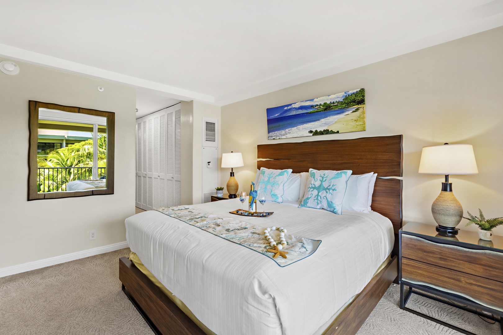 Wake up to island light and step straight out to sweeping resort views. This bright, airy bedroom opens to a private balcony, blending comfort and indoor-outdoor living in the heart of paradise.