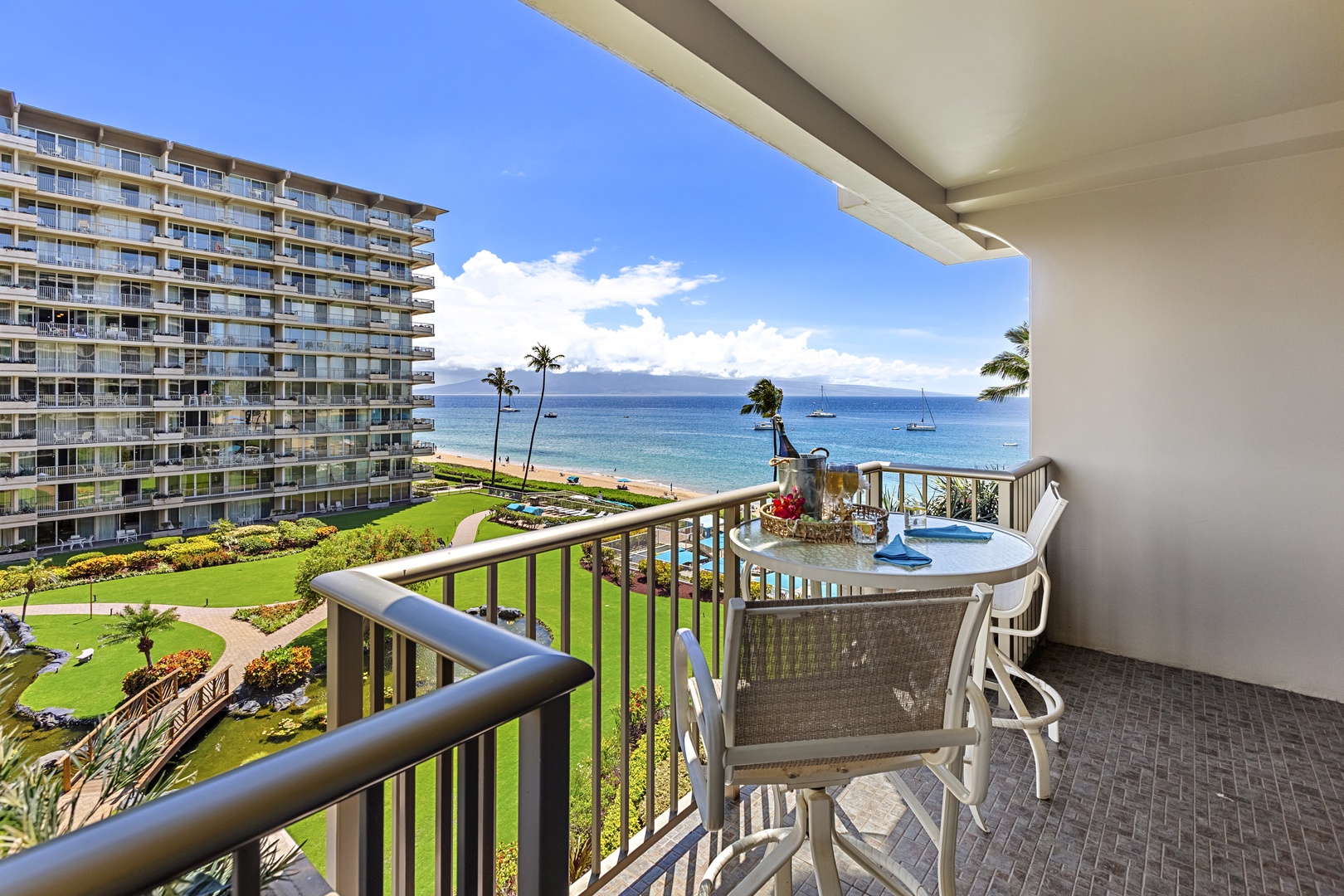Your private balcony offers breathtaking ocean views where you can sip morning coffee while watching boats drift across crystal-clear waters.