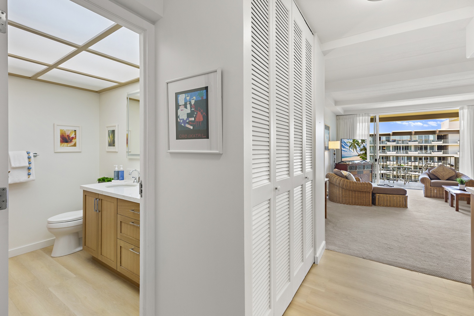 Step into your bright coastal retreat, where clean lines and warm wood floors flow effortlessly through the space, and your private balcony invites endless ocean breezes.