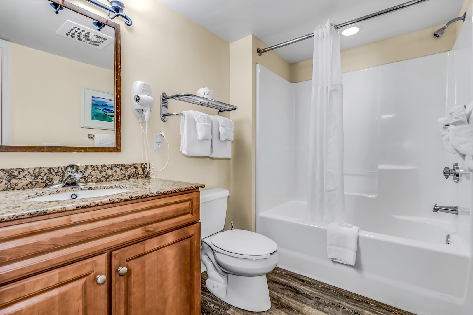 Relax in your private bathroom with granite counters, fluffy towels, and a full tub-shower combo.