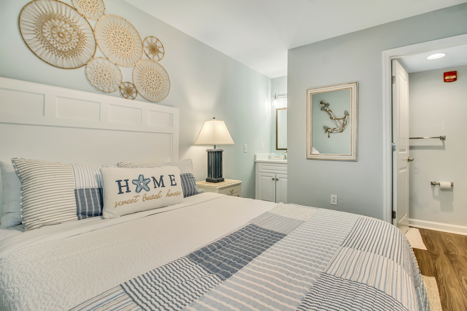 Your coastal retreat awaits with soft linens, nautical charm, and thoughtful touches that make you feel right at home.