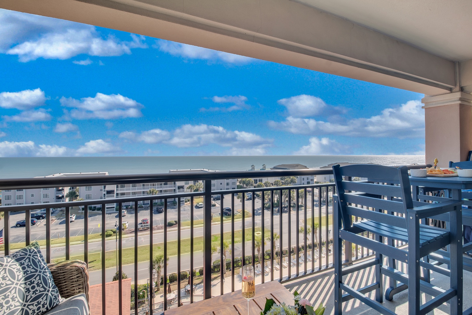 Unwind on your private balcony with stunning ocean views, comfortable seating, and refreshing sea breezes.