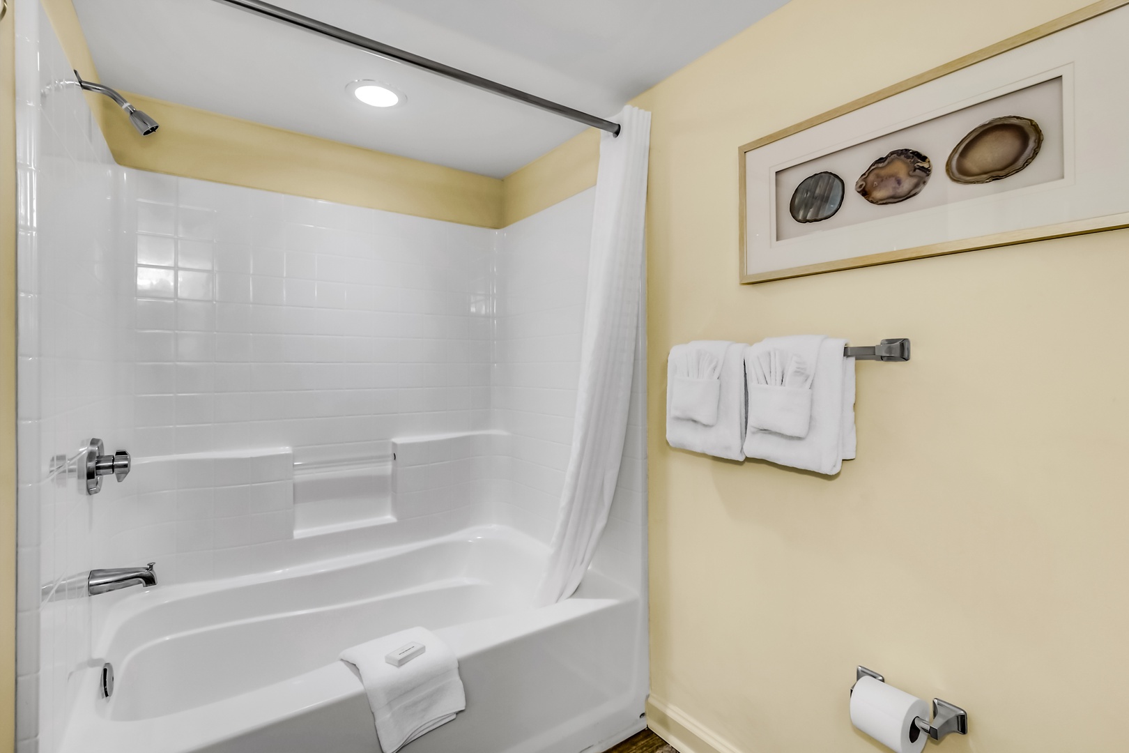 Soak away your travel stress in your private tub-shower combo, complete with fresh towels and cheerful décor.