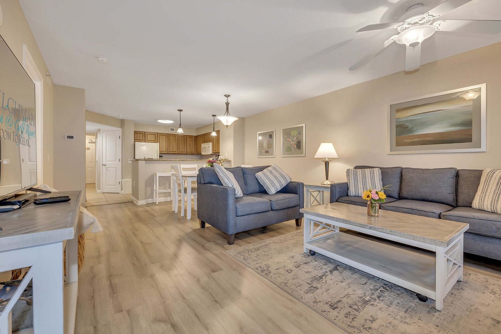 Stretch out on plush sofas in your bright, open living space, where soft neutral tones and airy ceilings create the perfect spot to unwind after a day of adventure.