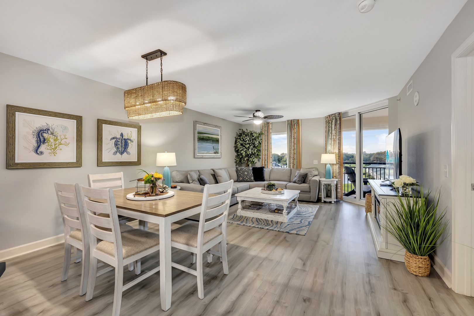 Bright coastal retreat with soft neutrals and natural textures. Gather at the dining table, unwind on plush sofas, then step to your private balcony for unforgettable views.