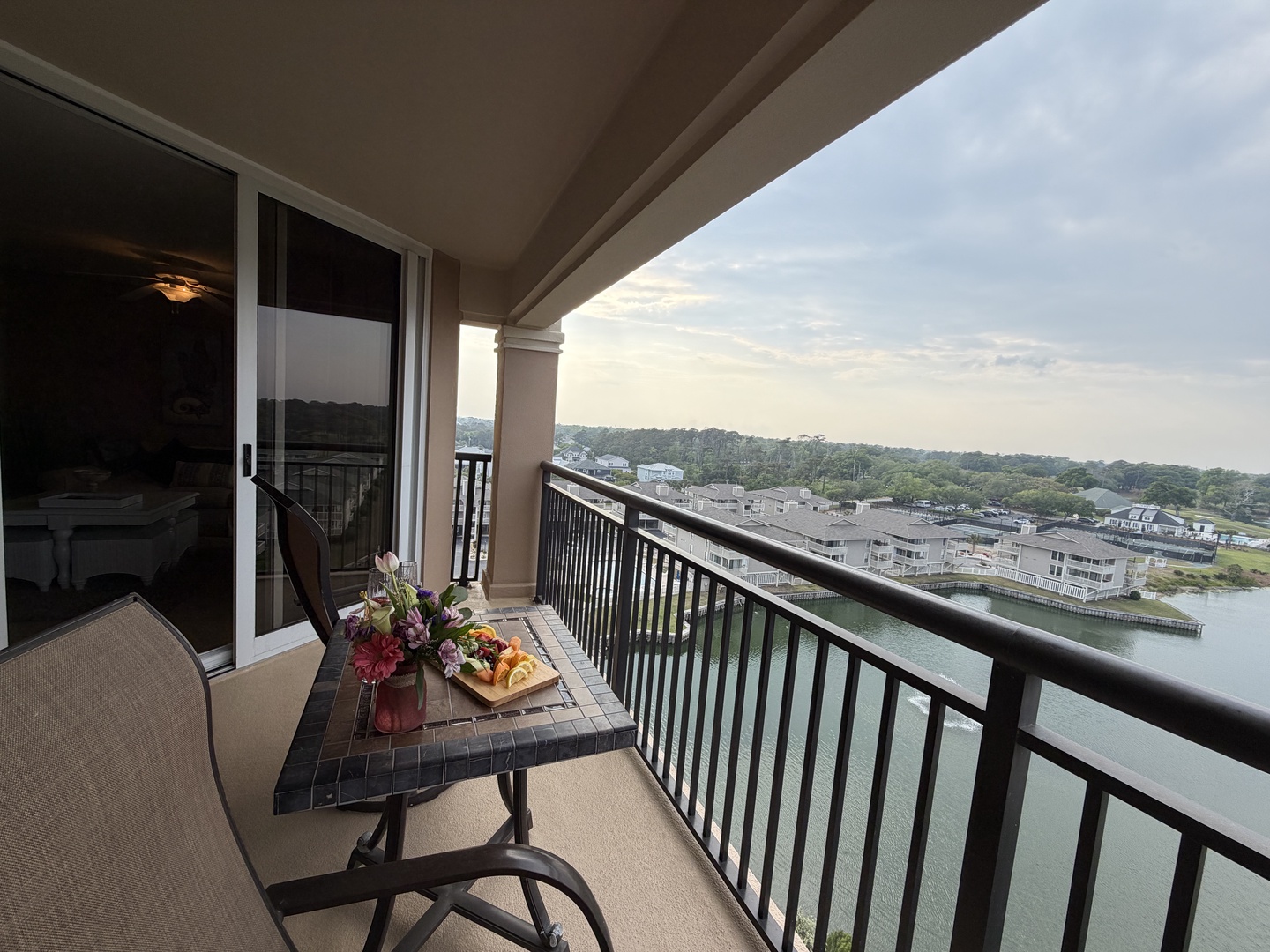 Unwind on your private balcony with stunning water views, perfect for morning coffee or evening relaxation with scenic lakeside panoramas.