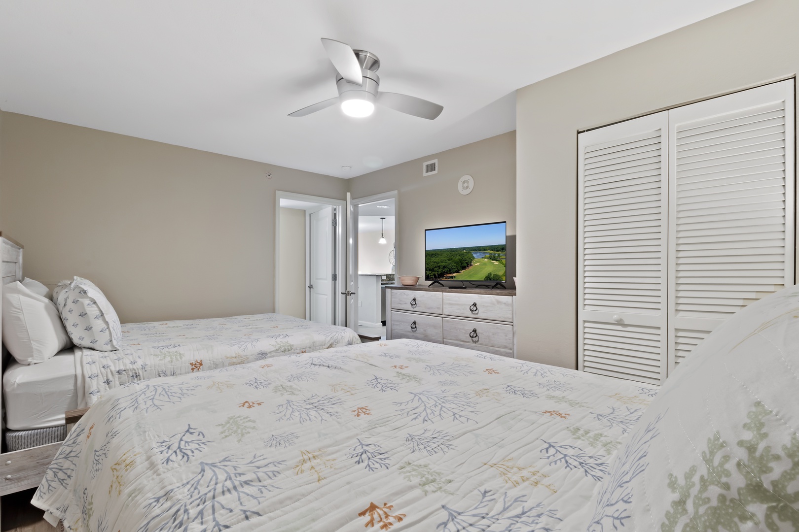 Rest peacefully in your comfortable bedroom with twin beds, ceiling fan, and TV for entertainment after your adventures.