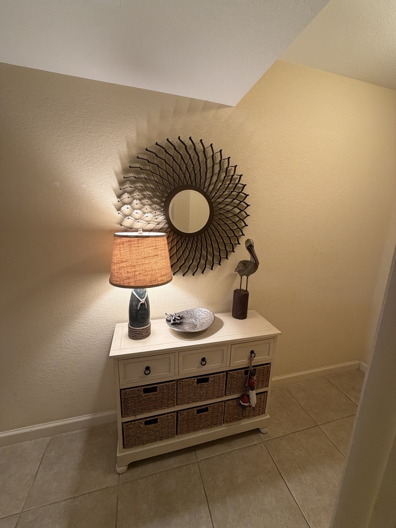 Refresh in your private bathroom with modern fixtures and thoughtful touches like woven storage baskets.