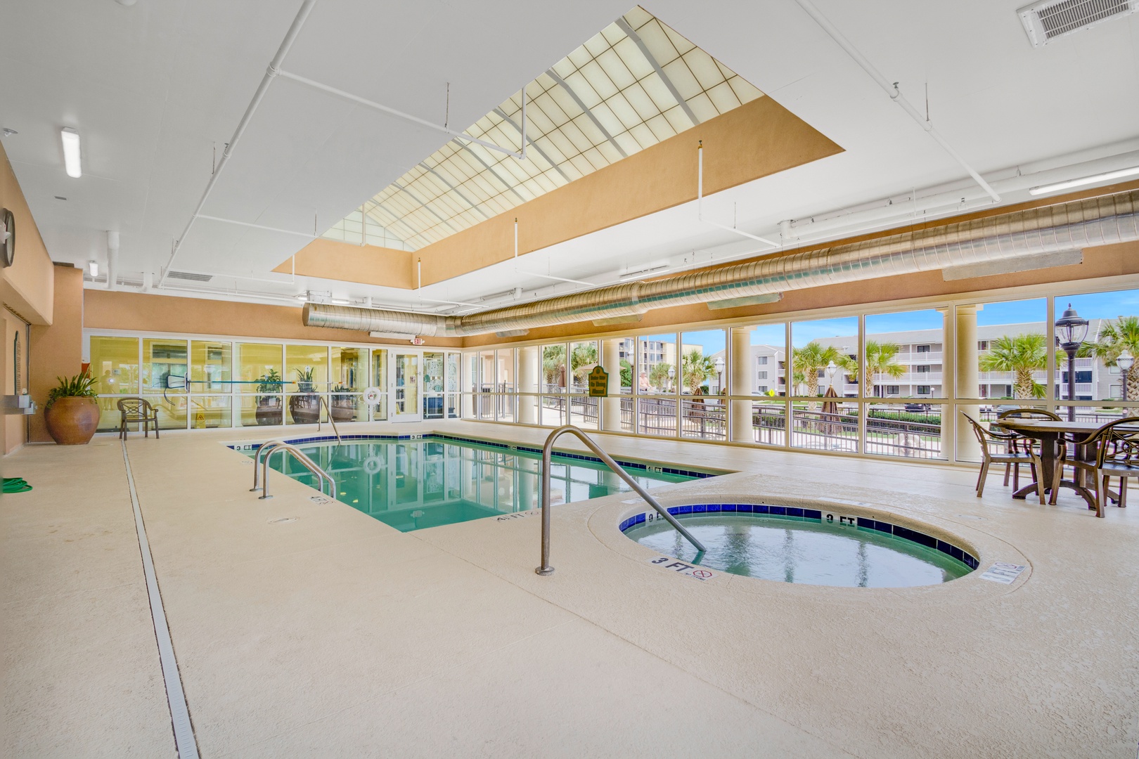 Unwind in the sparkling indoor pool, soak in the hot tub, and enjoy sunny views through floor-to-ceiling windows any time of year.