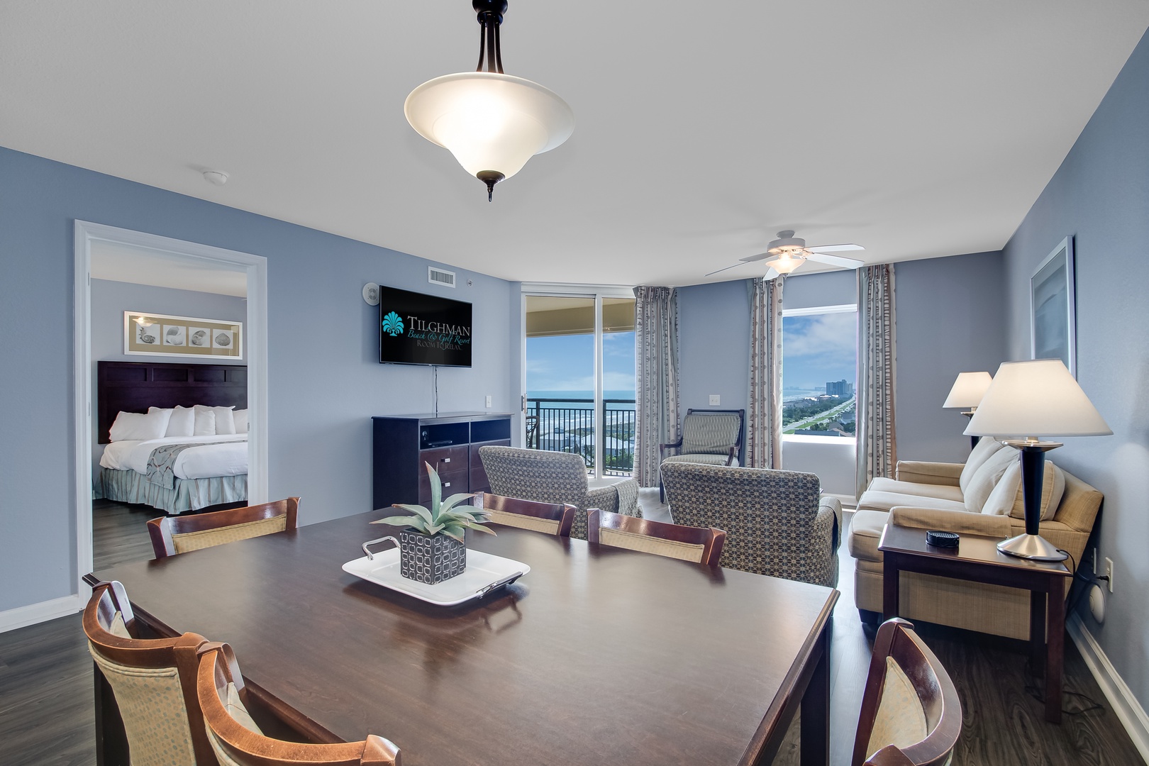 Relax in your spacious suite with ocean views, comfortable seating, and elegant touches throughout your coastal retreat.
