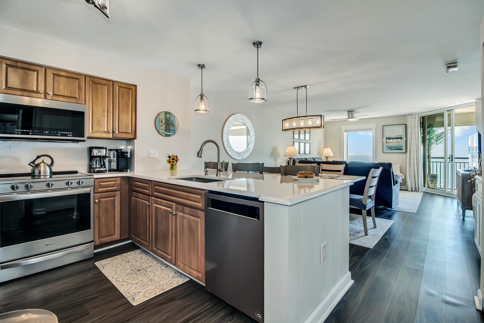 Your fully equipped kitchen flows seamlessly into the living area, perfect for preparing meals while staying connected with family.