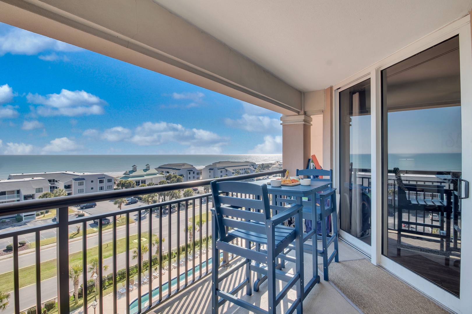 Sip your morning coffee while enjoying stunning ocean views from your private balcony, where blue skies meet endless coastline.