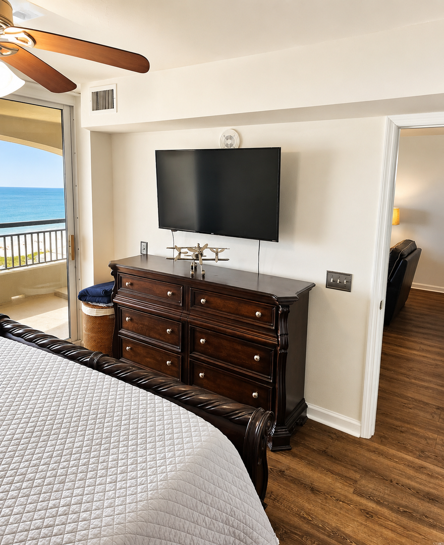 Drift off with the soothing sound of waves just beyond your private balcony. Your bedroom features a plush bed, flat-screen TV, and stunning ocean views.
