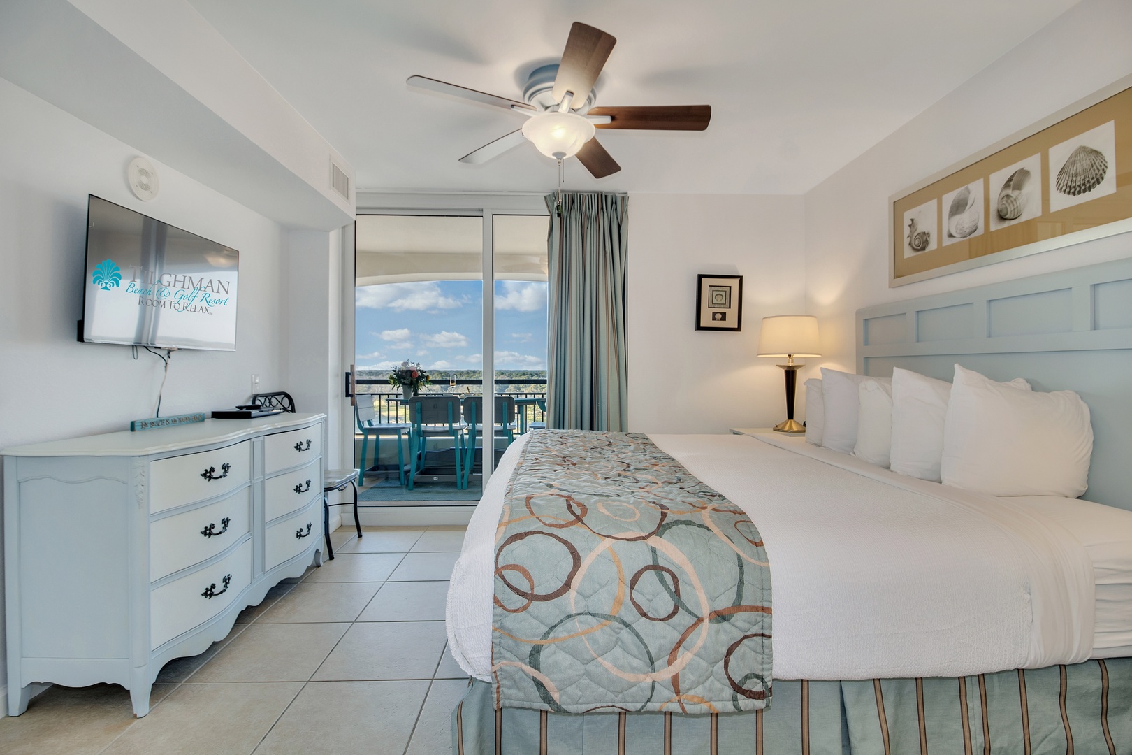 Wake up to ocean views from your cozy bedroom with nautical touches and modern comfort.