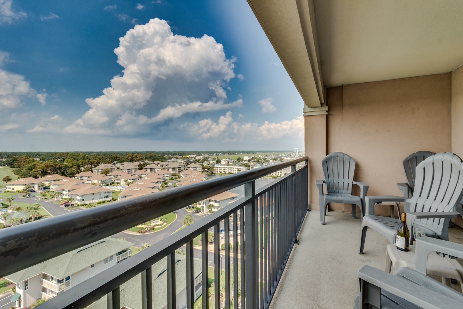 Relax in your private balcony chairs while taking in sweeping views of the peaceful neighborhood below.