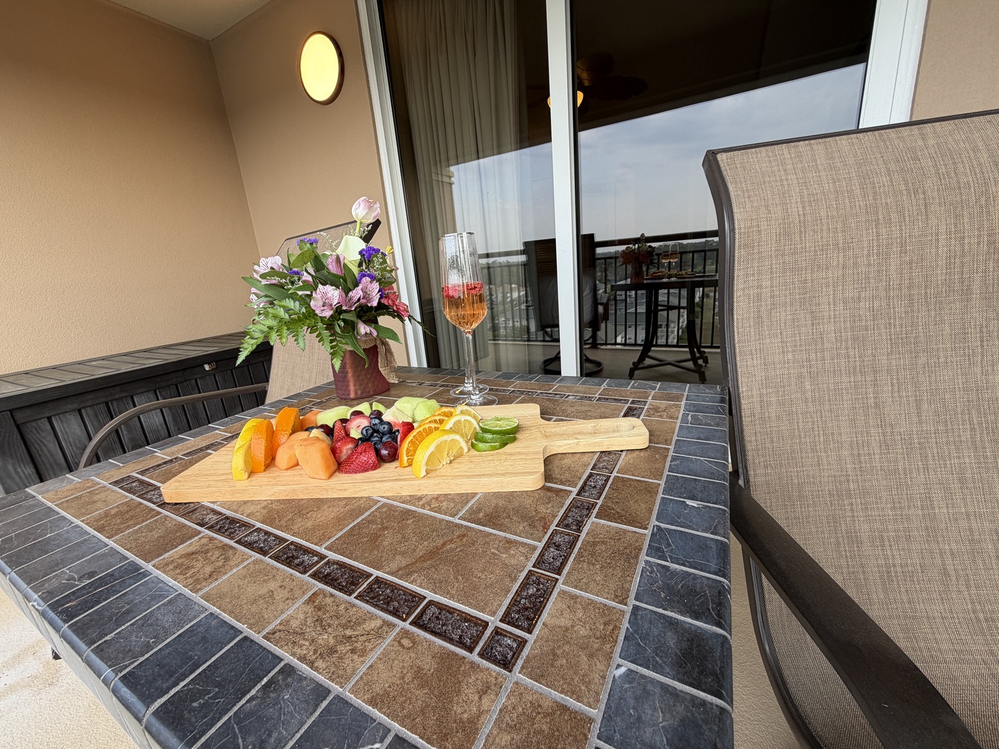 Savor fresh fruit and wine on your private balcony with comfortable seating and beautiful city views.
