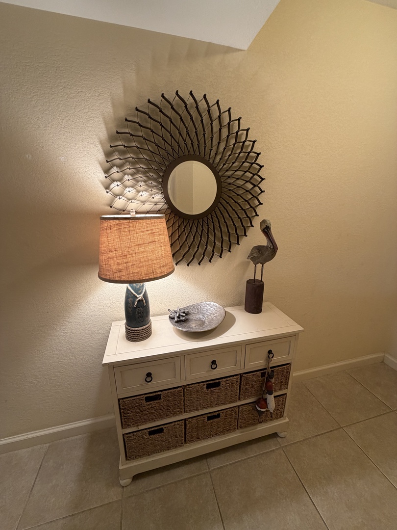 Your stylish retreat features thoughtful storage with wicker baskets and modern touches throughout.
