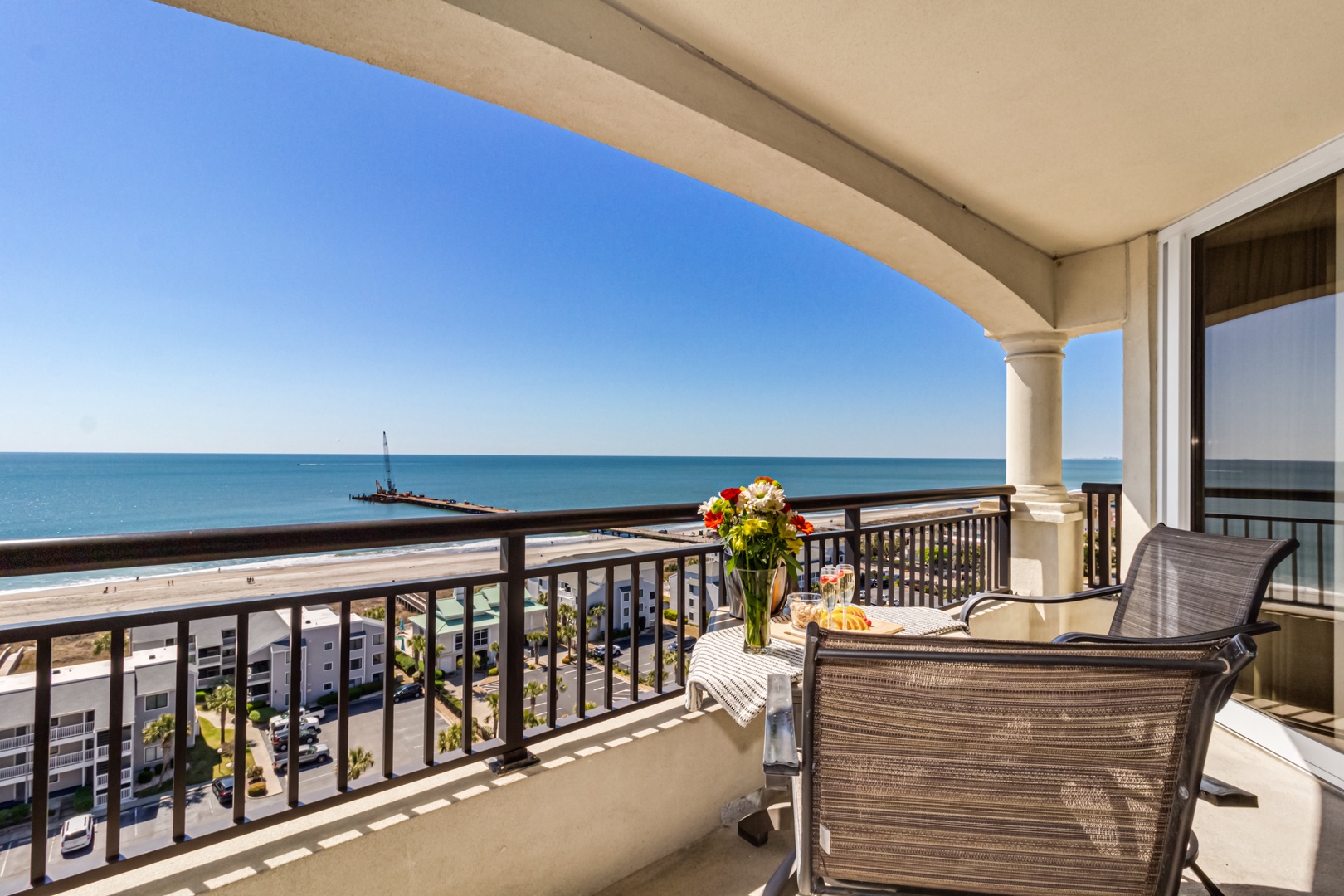 Sip your morning coffee while gazing at endless ocean views from your private balcony, where gentle sea breezes and stunning coastline create pure bliss.