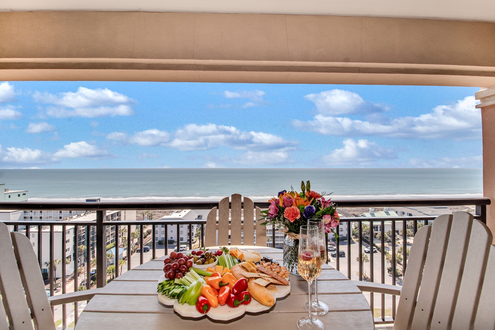Savor your morning coffee and fresh fruits on your private balcony while watching waves dance beneath endless blue skies.