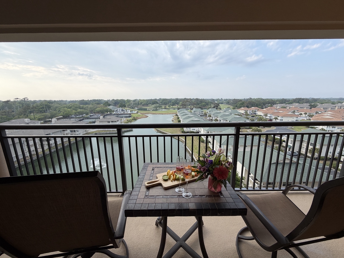 Sip your morning coffee on your private balcony while taking in sweeping views of the golf course and lake below.