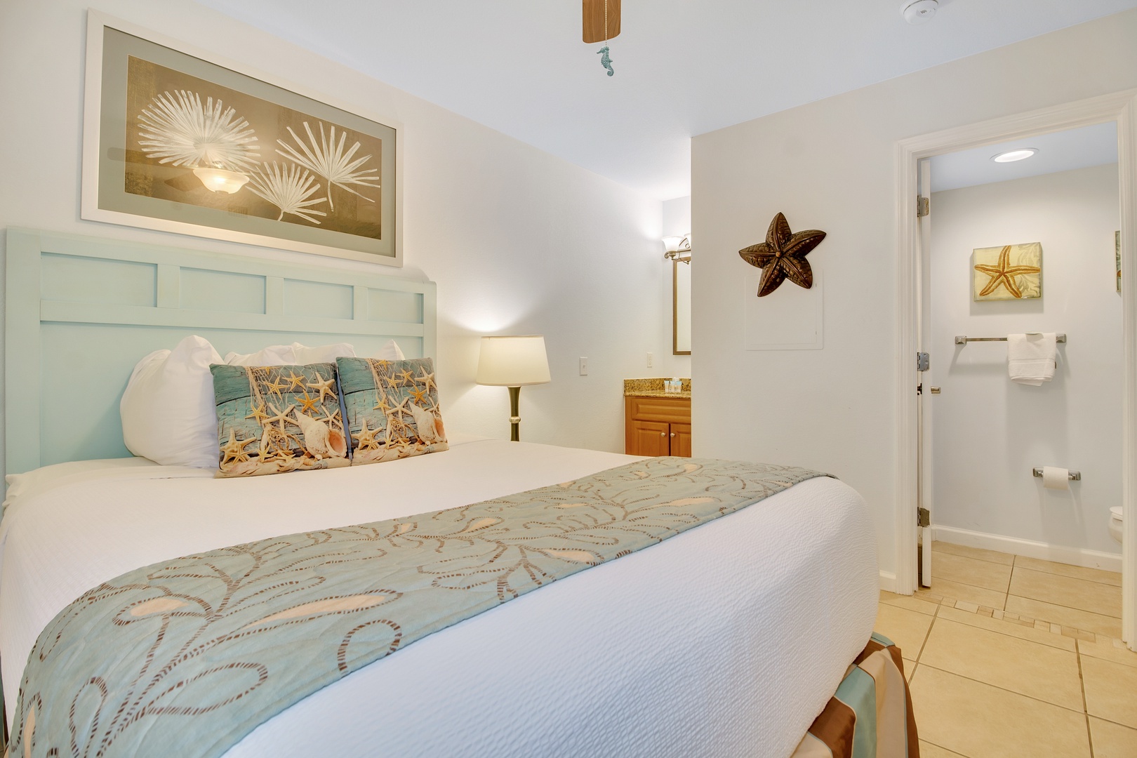 Drift off to sleep in your coastal-themed bedroom, where soft seafoam linens and starfish accents create a tranquil seaside escape.