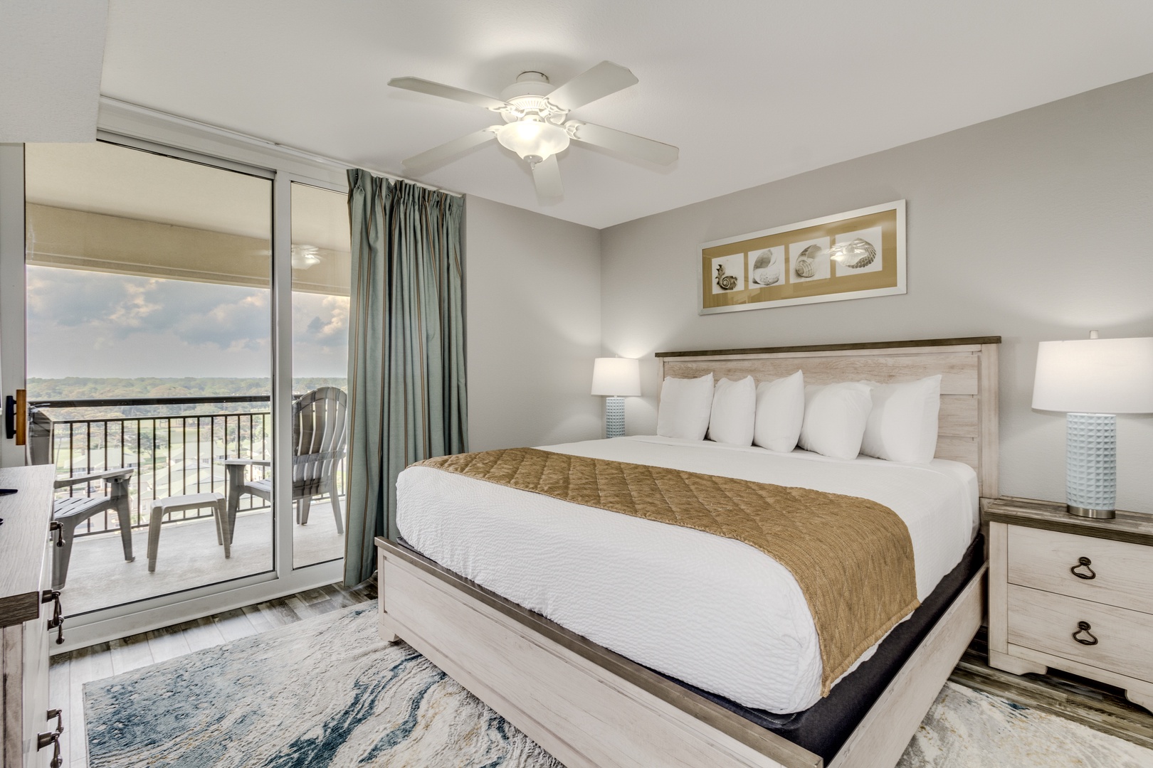 Wake up to ocean views in this serene bedroom featuring a plush king bed and private balcony for morning coffee.